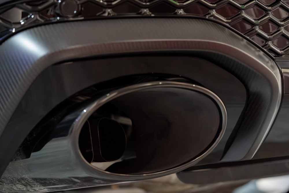 shiny carbon fiber part after being made with prepreg resin content